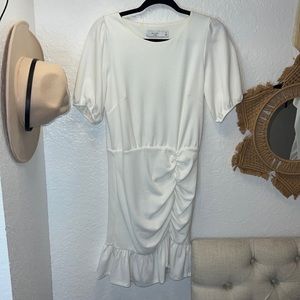 PO: Women’s White Ruffle bottom dress.